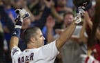 Minnesota Twins Joe Mauer came out for a curtain call after hitting a grand slam home run in the fifth inning.