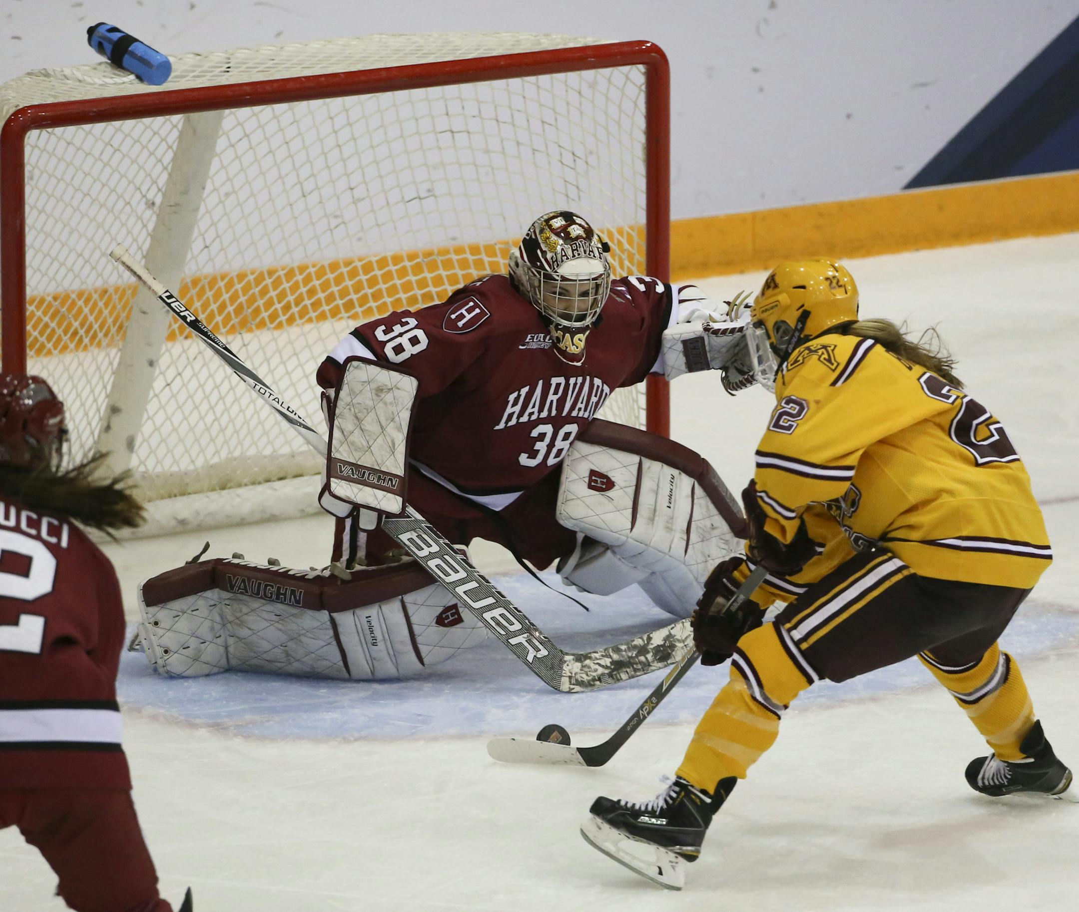 Minnesota center Hannah Brandt (22) scored the winning goal in the third period with this backhand on Harvard goalie Emerance Maschmeyer (38) Sunday afternoon at Ridder Arena. ] JEFF WHEELER ï jeff.wheeler@startribune.com The University of Minnesota women's hockey team beat Harvard 4-1 for the NCAA Women's Frozen Four Championship Sunday afternoon, March 22, 2015 at Ridder Arena in Minneapolis.