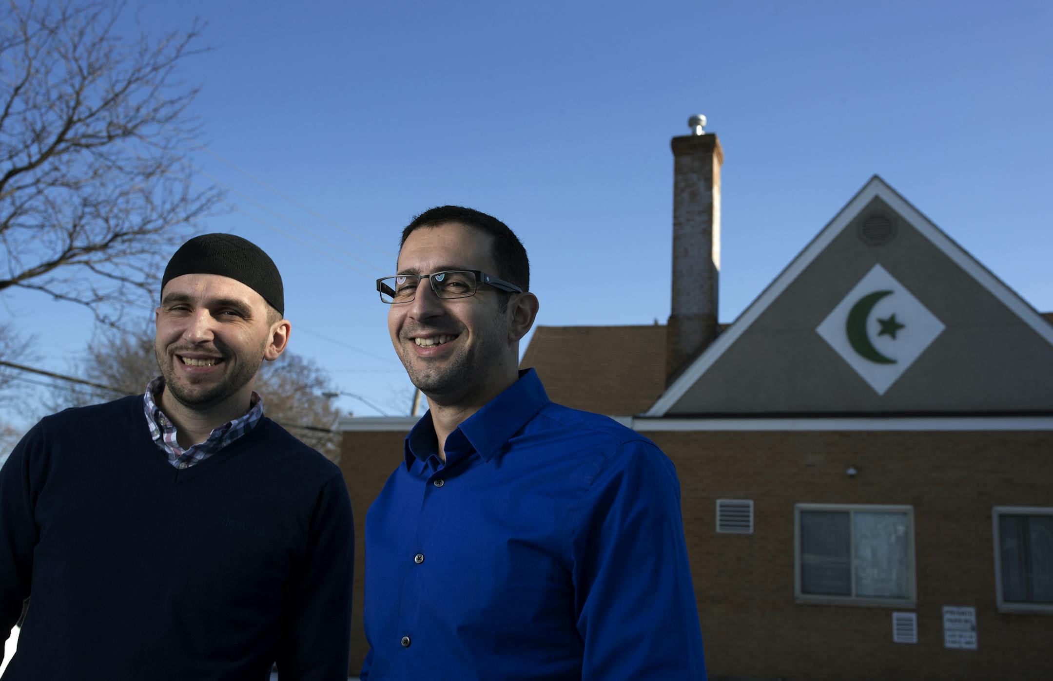 "People of all religions have helped my family," said Bosnian immigrant Enes Gluhi, right, with Imam Jasmin Suljkanovic. "I have never felt the hatred and animosity that I do now."