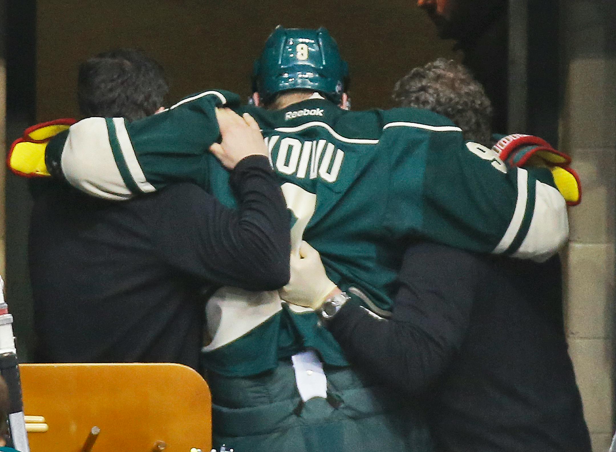 Mikko Koivu was helped to the dressing room after fracturing his right ankle on Saturday against Washington. He returned to get two assists, but later left. He will miss one month.
