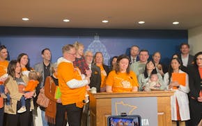 Miraya Gran spoke at the Capitol in support of legislation that would require health plans to provide coverage for infertility treatment. Her husband