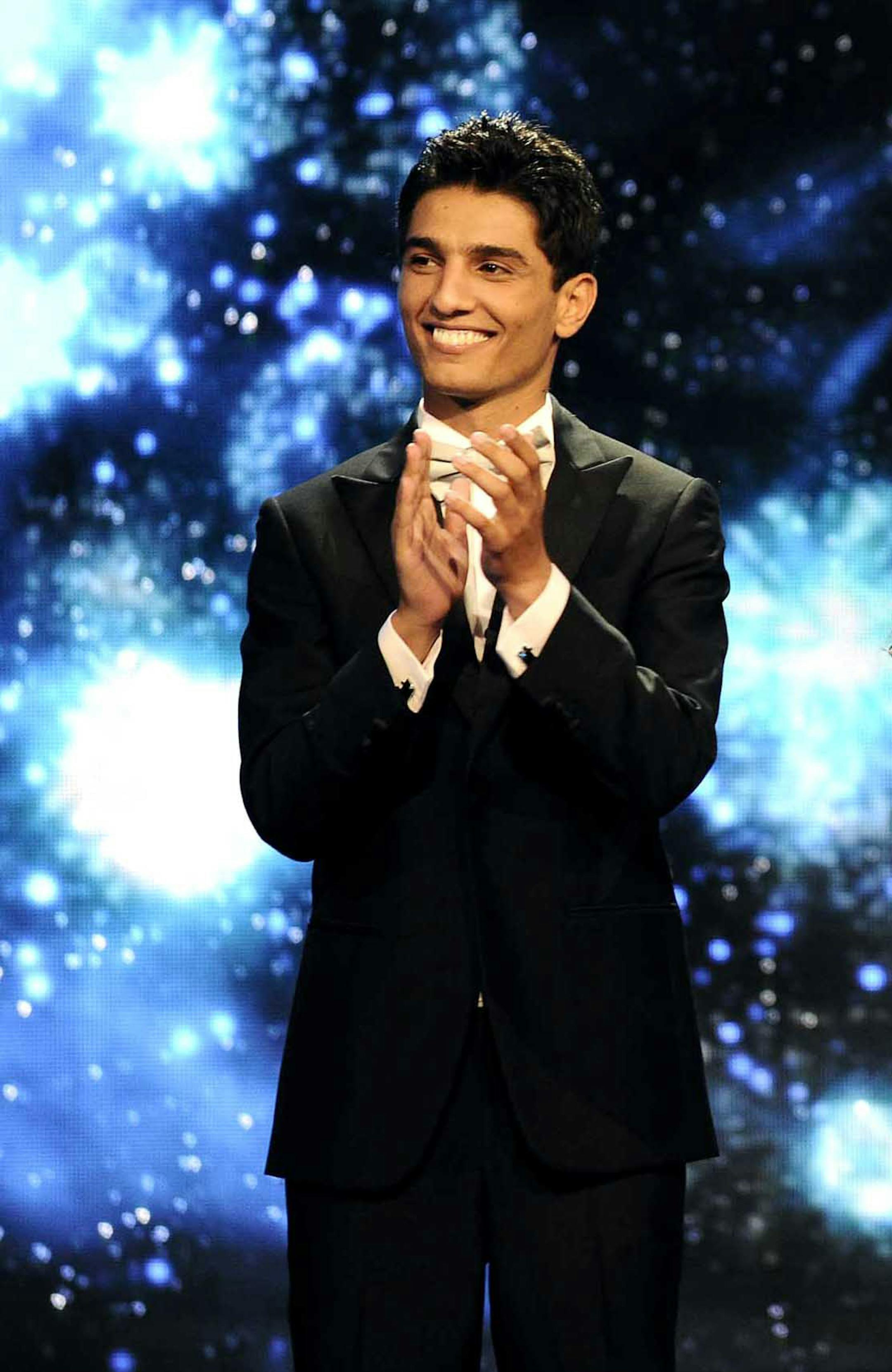 In this Saturday, June 22, 2013 photo released by the MBC Group, singer Mohammed Assaf is seen on the Arab Idol stage in Beirut, Lebanon. On Saturday night, Assaf became the first Palestinian to win the Arab worldís version of American Idol, setting off wild celebrations across the Palestinian territories. After the victory, Palestinian President Mahmoud Abbas declared the singer an honorary ambassador. (AP Photo/MBC Group)