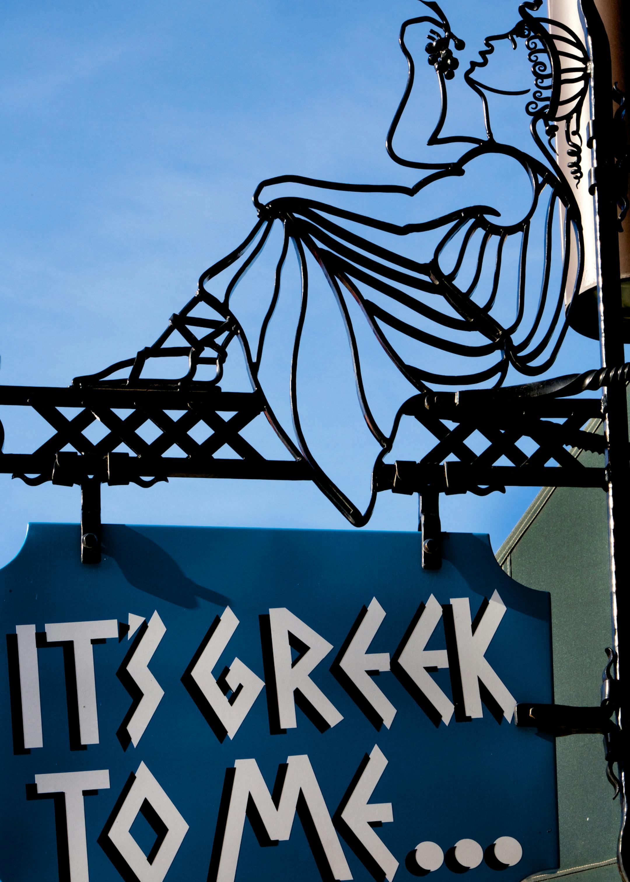 STEVE RICE Çƒ¢ srice@startribune.com Minneapolis, MN 10/28/2008] Sign atop the door at It's Greek to Me at 626 W. Lake St.