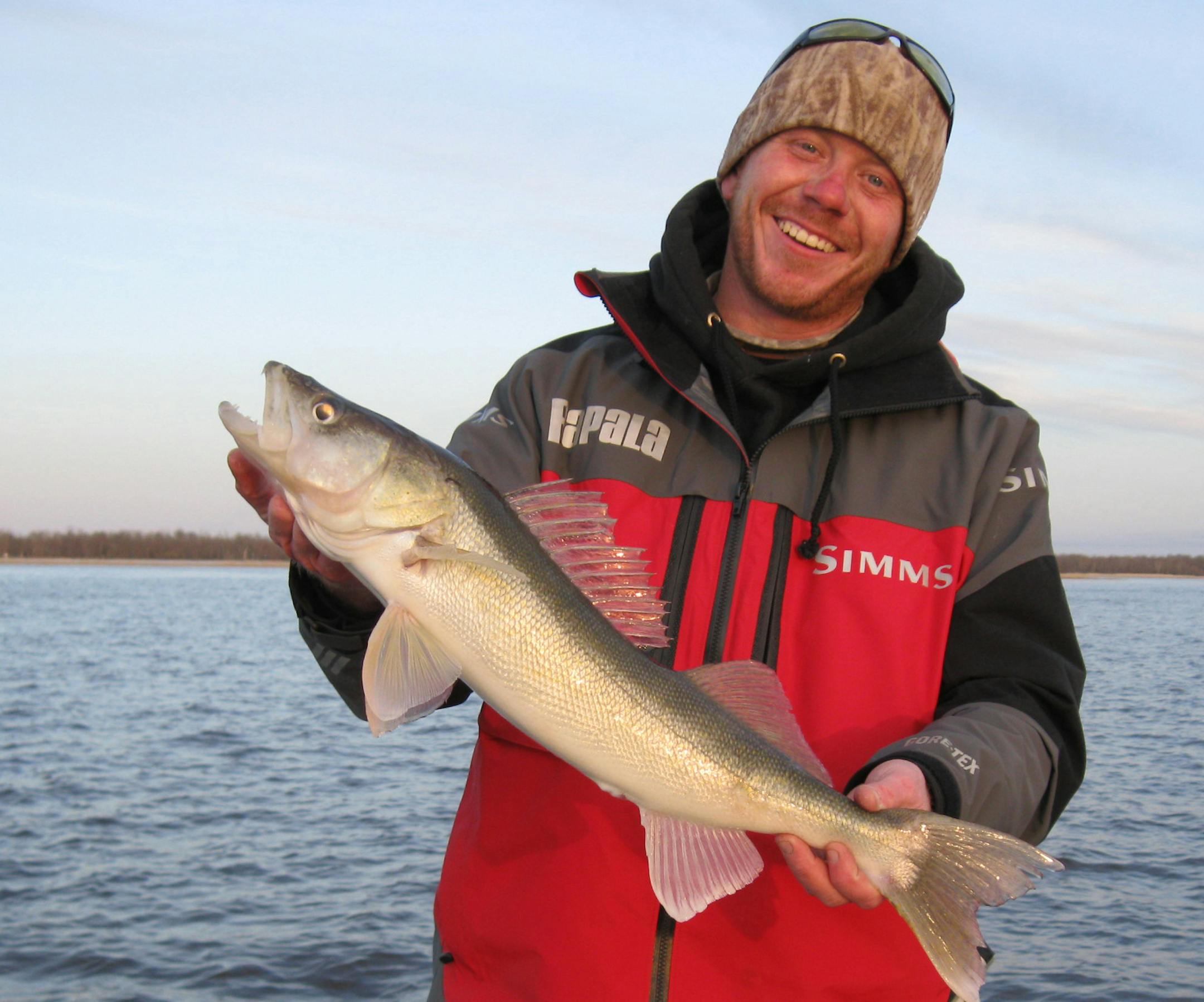 Adam Steinhilber of Excelsior with a 27-inch walleye he caught and released on Lake of the Woods.