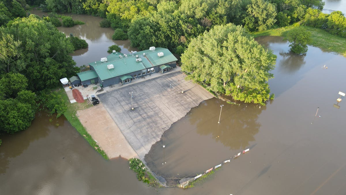 Neisen's Riverside Sports Bar in St. Peter, Minn., is now surrounded by water from the swollen Minnesota River.
