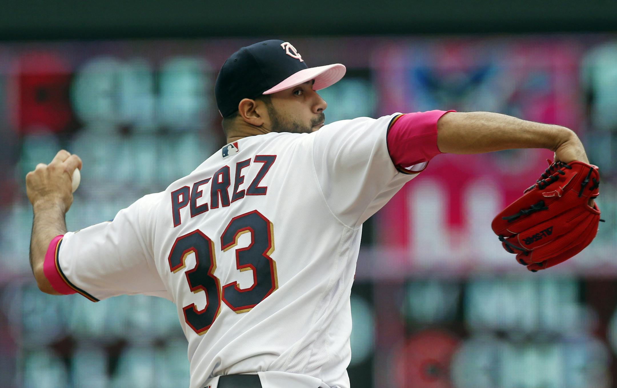 Minnesota Twins pitcher Martin Perez throws against the Detroit Tigers in the first inning of a baseball game Sunday, May 12, 2019, in Minneapolis. (AP Photo/Jim Mone) ORG XMIT: MNJM101