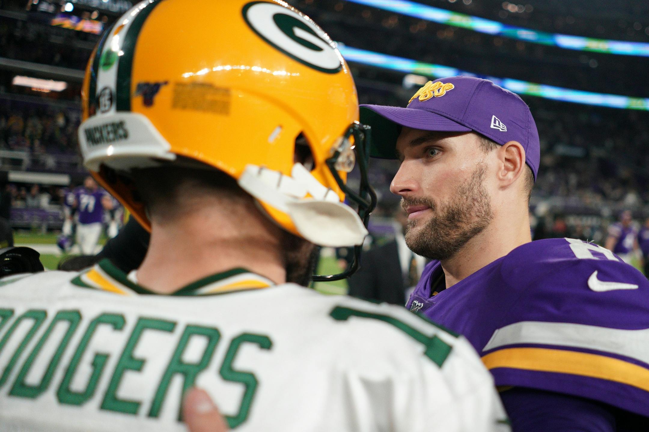 A wide eyed Minnesota Vikings quarterback Kirk Cousins (8) greeted Green Bay Packers quarterback Aaron Rodgers (12) after Monday night's loss.