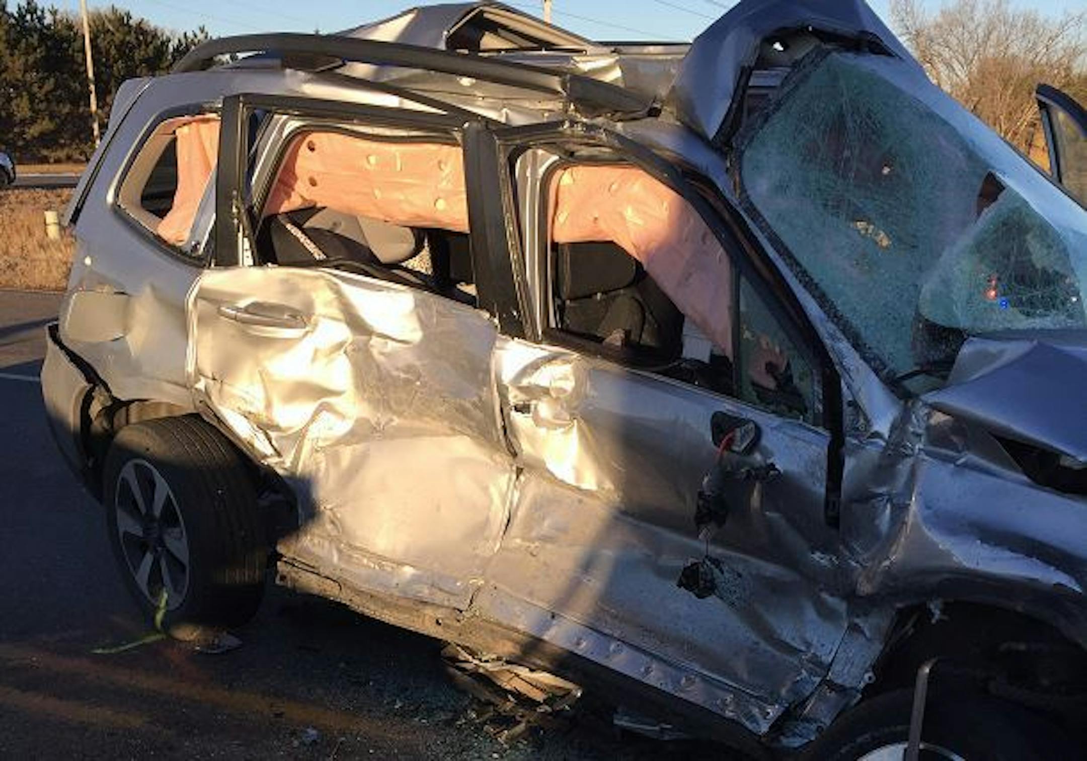 A semitrailer truck ran a stop sign in central Minnesota and hit this vehicle. The car's driver, five months pregnant, was killed.