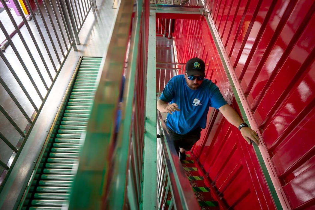 Joey Weaver, owner of Fair Ride Entertainment and a lifelong carnival worker, climbed to the top of the New York New York Fun House. “I've done this my entire life, and I love it: New places, new people,” said Weaver, 33, of Tampa, Fla.