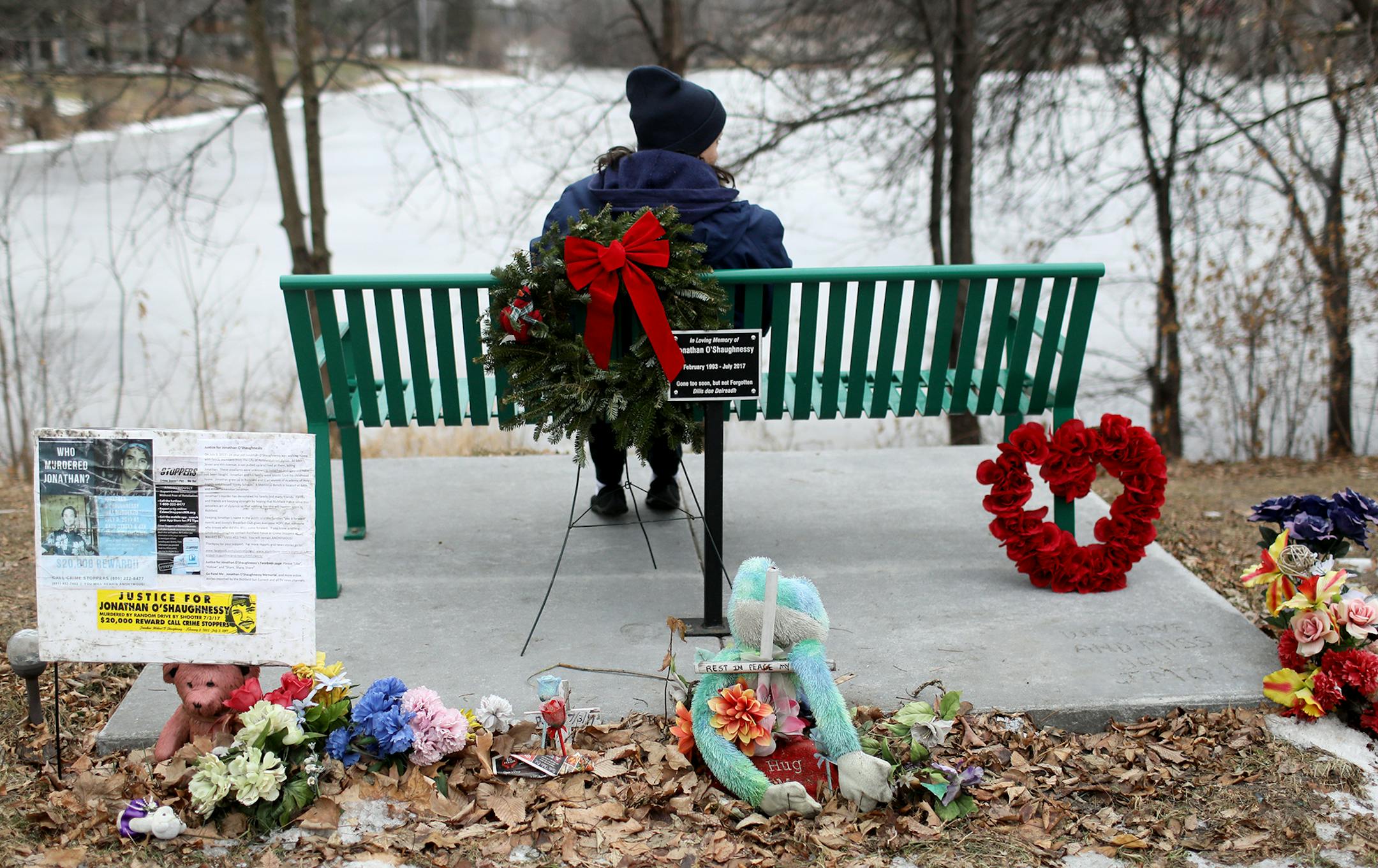 A memorial to Johnathan O'Shaughnesy near the intersection of 4th Ave. S and E. 64th St. could disappear, near where the 24 year-old was gunned down in July and seen Friday, Dec. 21, 2018, in Richfield, MN. Here, Cynthia Kuntz, Johnathan's mother, regularly visits the memorial, often just sitting on the bench dedicated to him.] DAVID JOLES • david.joles@startribune.com Richfield wants family to remove flowers and spontaneous memorials from the site of shooting death of Jonathan OShaughnes