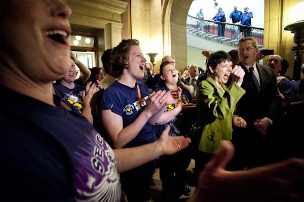 AFSCME and SEIU members cheered Senator Sandy Pappas and Rep. Michael Nelson, co authors of the daycare unionization bill after passage of the bill 68