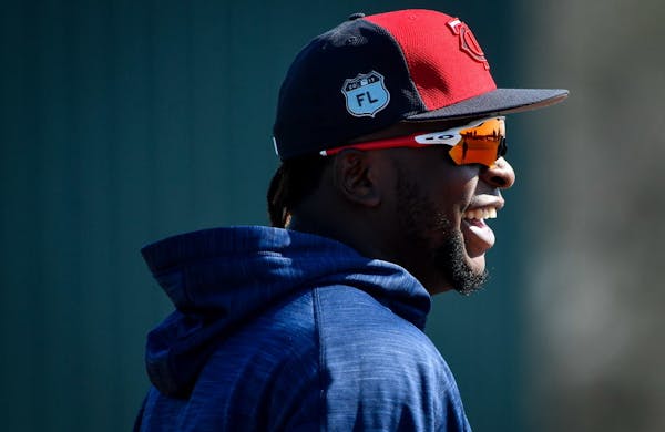 Minnesota Twins third baseman Miguel Sano (22) joked with teammates during an optional workout this spring.