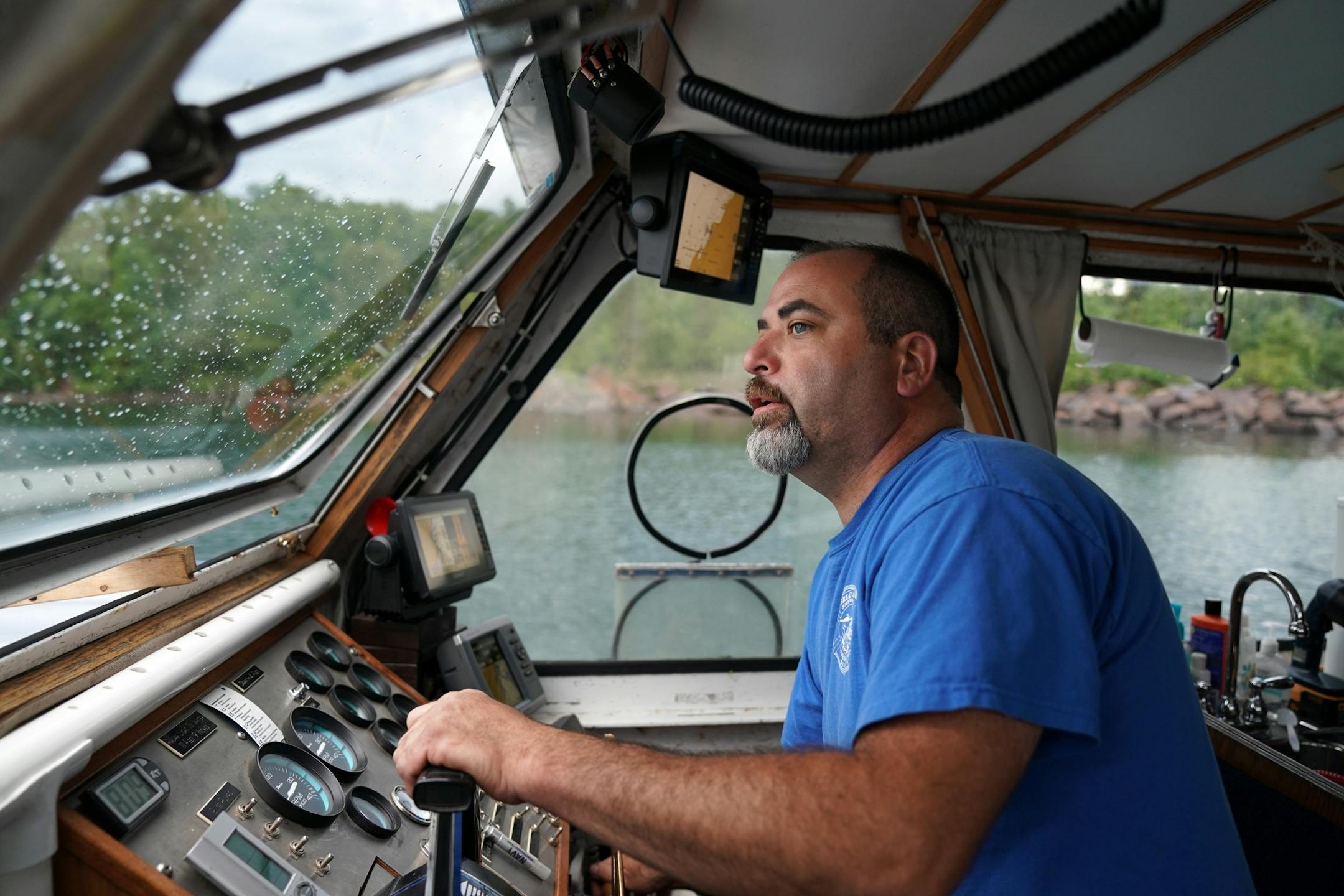 Corey Daniel, a diver with the Great Lakes Shipwreck Preservation Society from Duluth, drove the group's boat the RV Preservation from the Silver Bay Marina out to the site of the Madeira shipwreck near Split Rock Lighthouse.
