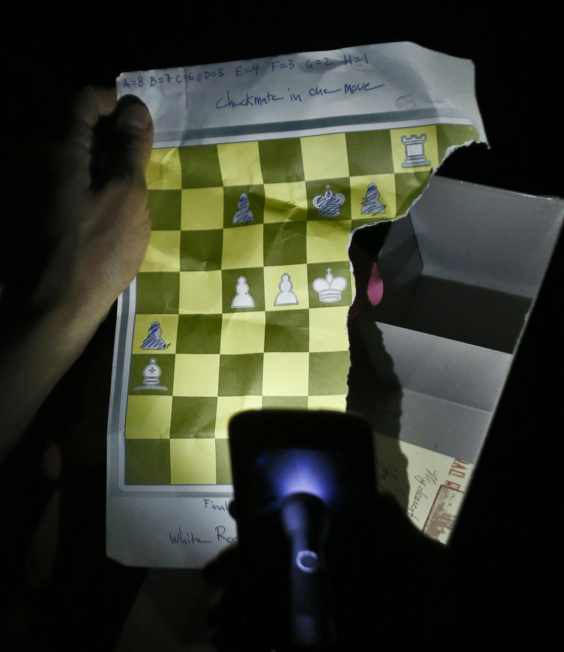 A group works on the various clues presented to them in an effort to find passage out of the riddle room.