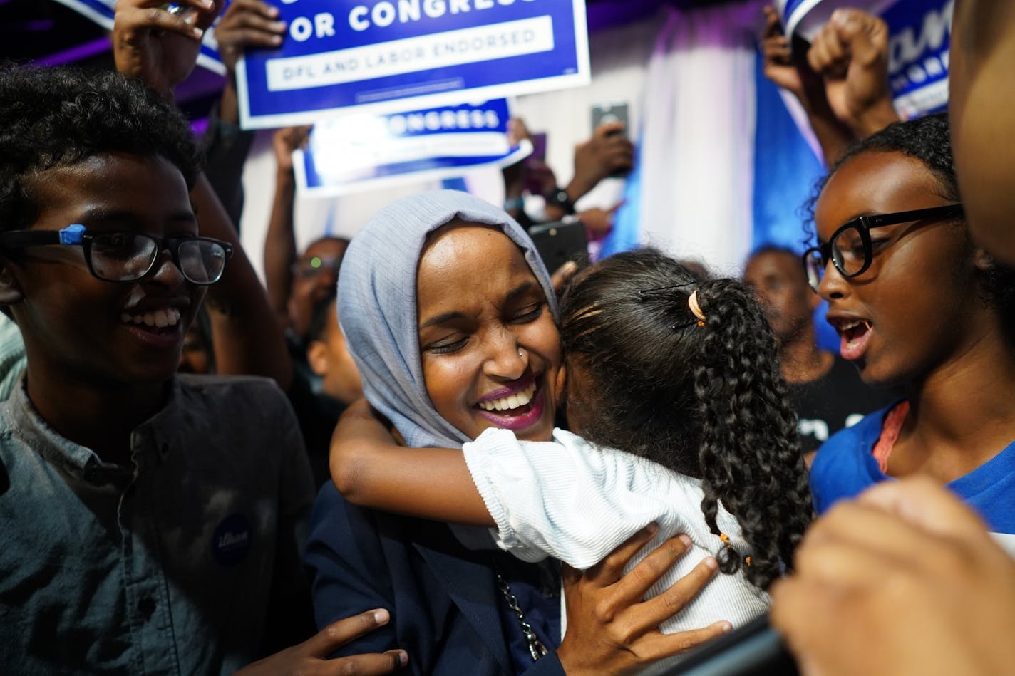 Rep. Ilhan Omar celebrated with her children after her primary victory.