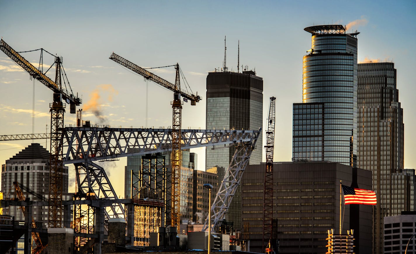 Cranes dominate the Minneapolis skyline as the Vikings stadium rises. ] GLEN STUBBE * gstubbe@startribune.com Tuesday, January 13, 2015