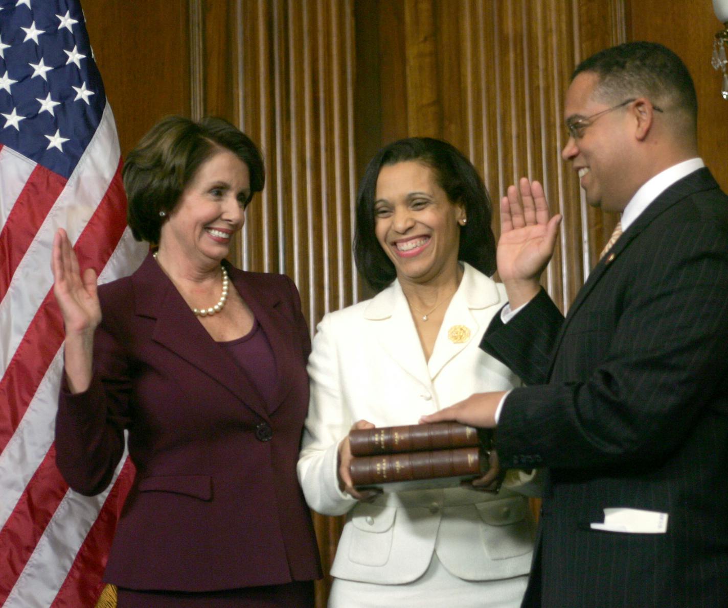 Rep. Keith Ellison, D-Minn., took the oath of office during a re-enactment swearing-in ceremony, on Capitol Hill in Washington in 2007. Ellison's wife, Kim, holds Thomas Jefferson's Quran. At the time, Roy Moore of Alabama urged Congress not to seat Ellison because of his Muslim beliefs.