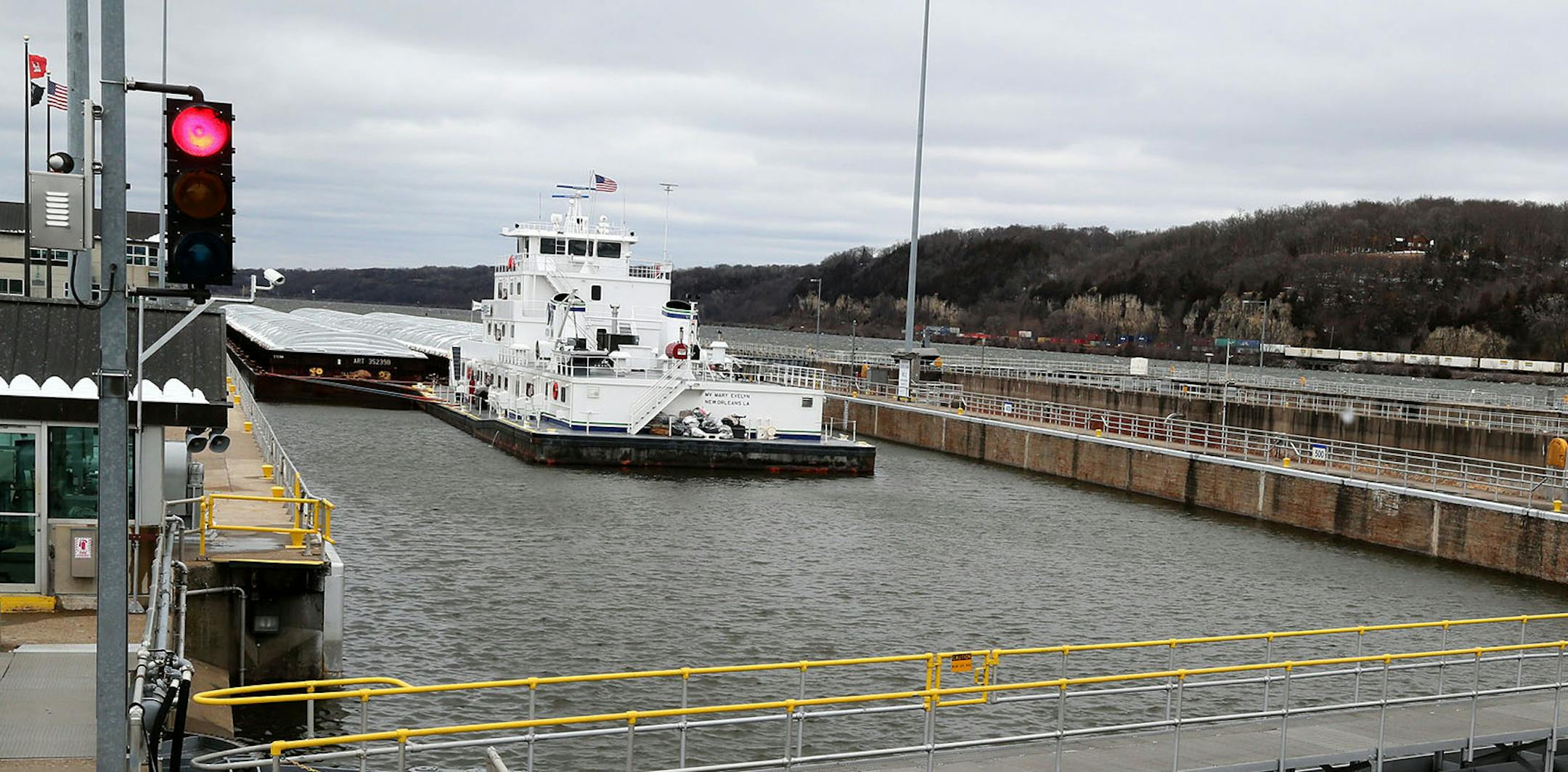 The tug the Mary Evelyn, among the first to ply the waters during the opening of the shipping season on the Mississippi River in Minnesota, sits in Lock and Dam No. 2 Tuesday, March 25, 2015, near Hastings, MN.](DAVID JOLES/STARTRIBINE)djoles@startribune.com The first towboats of the 2015 shipping season are expected to arrive in St. Paul any day now. As of late Tuesday, the Mary Evelyn and the New Dawn were just south of Lake Pepin and breaking through ice while making their way north with more