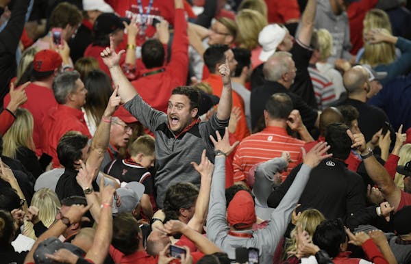Texas Tech fans cheered as their team beat Michigan State 61-51.