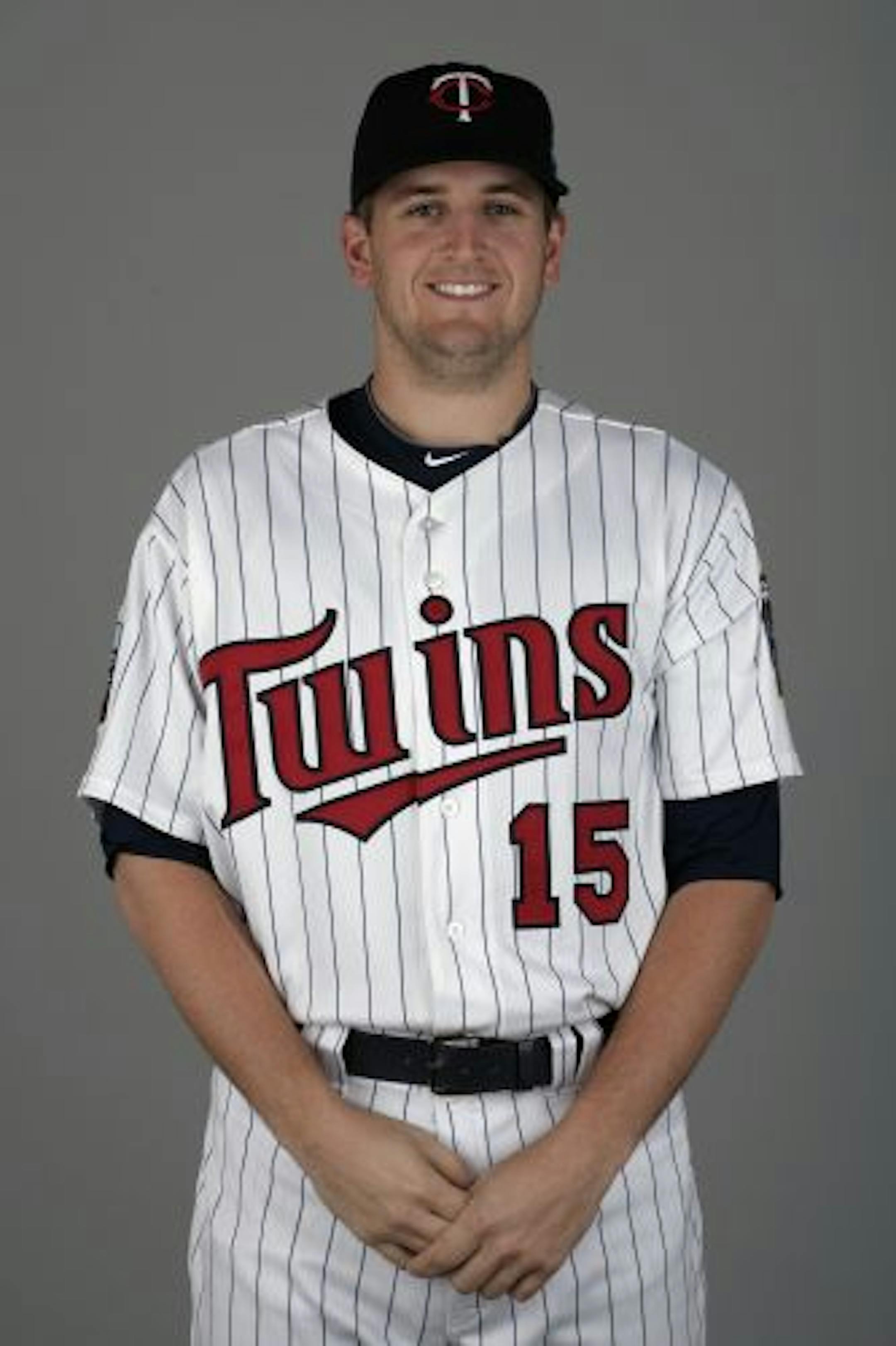 FORT MYERS, FL - MARCH 01: Glen Perkins #15 of the Minnesota Twins poses during Photo Day on Monday, March 1, 2010 at Hammond Stadium in Fort Myers, Florida. (Photo by Eliot J. Schechter/MLB Photos via Getty Images) Glen Perkins