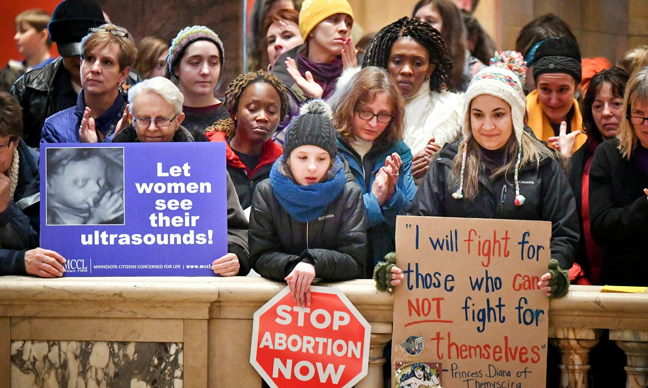 Over one thousand people showed up from around Minnesota as Minnesota Citizens Concerned for Life held a March on the State Capitol commemorating the 45th anniversary of the Roe v. Wade decision. The March for Life had to be moved from the Capitol steps to inside and heavy snow moved through the Twin Cities.