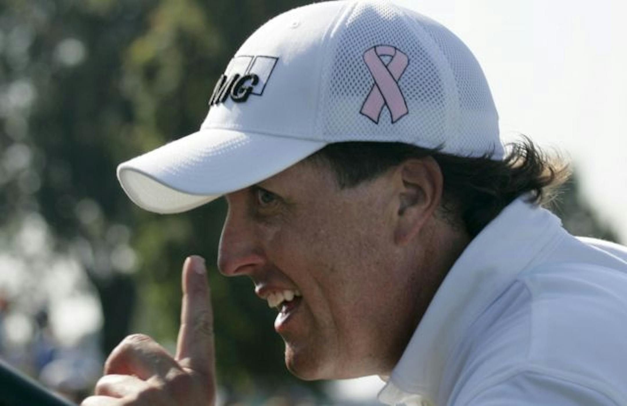 Phil Mickelson acknowledged a fan as he left the practice range and headed for the first tee Wednesday. The No. 2 golfer in the world has gotten to be so with the help of strength and conditioning coach Sean Cochran, a former Minnesotan.