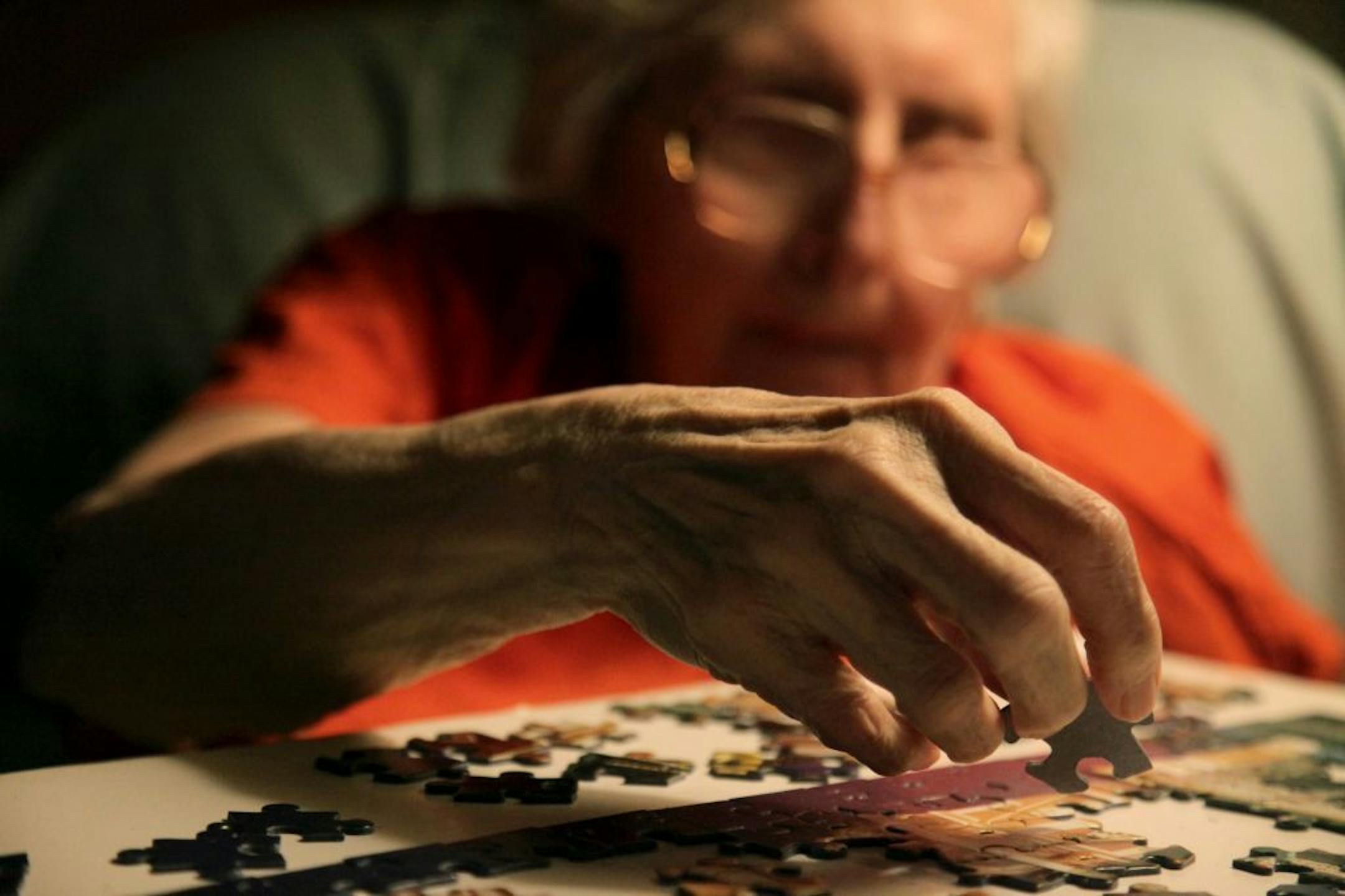 Joan Anderson got help by volunteer, Marie Schueller put a puzzle together while Joan's daughter Lynn Halverson got to get away for an afternoon.