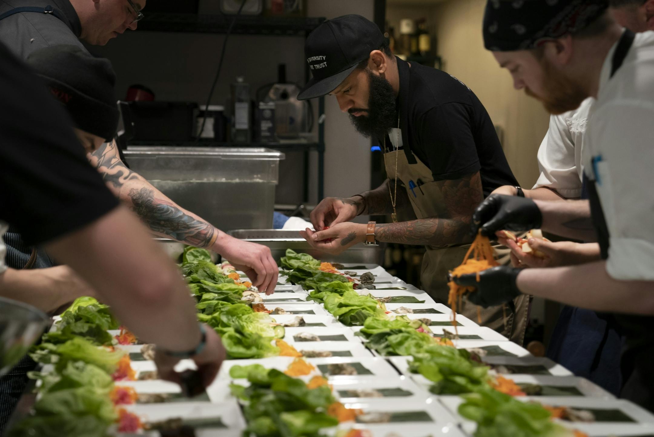 Chef and Top Chef contestant Justin Sutherland assembled a salad in the kitchen for a six course meal at the Handsome Hog in St. Paul, Minn., on Thursday, January 17, 2019.