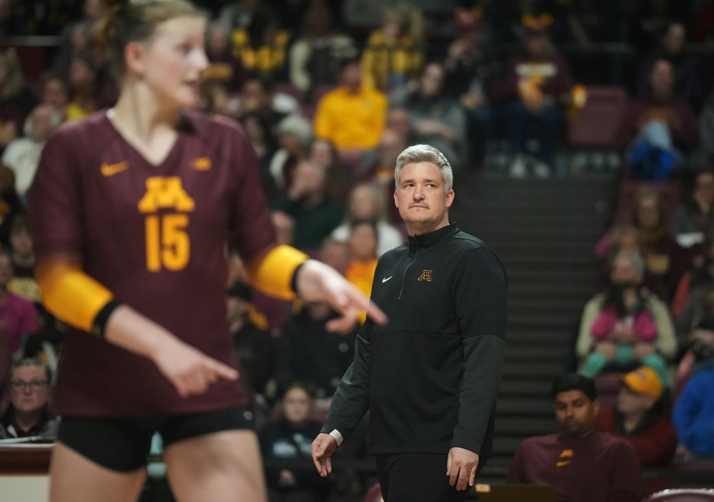 U of M head coach Keegan Cook keeps an eye on the game in Minneapolis, Minn., on Tuesday, April 4, 2023. The Gophers play an exhibition game against a professional outfit called Athletes Unlimited at Maturi Pavilion.] RICHARD TSONG-TAATARII • richard.tsong-taatarii @startribune.com