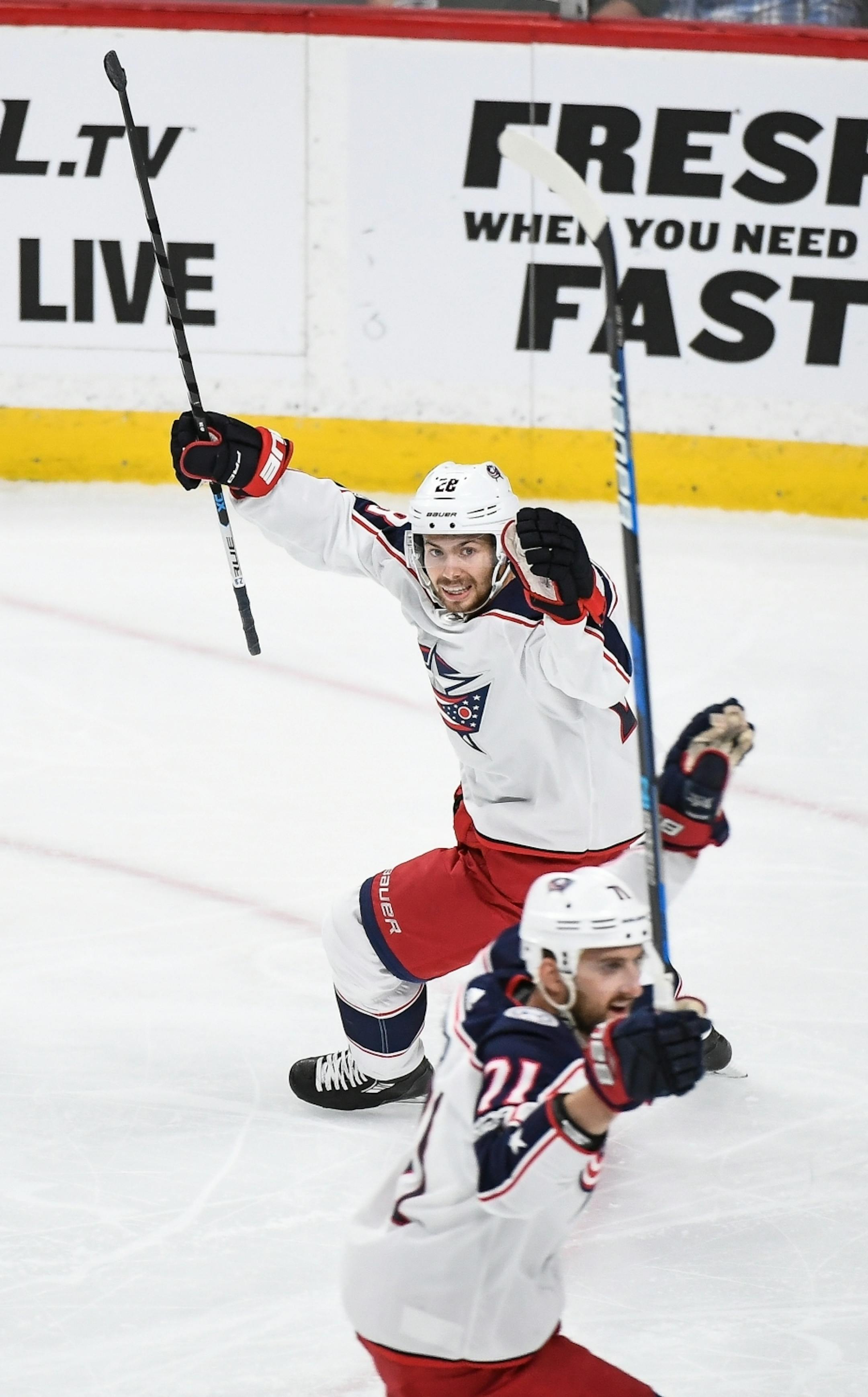 Columbus Blue Jackets right wing Oliver Bjorkstrand (28) celebrated a goal by defence man David Savard in the second period.
