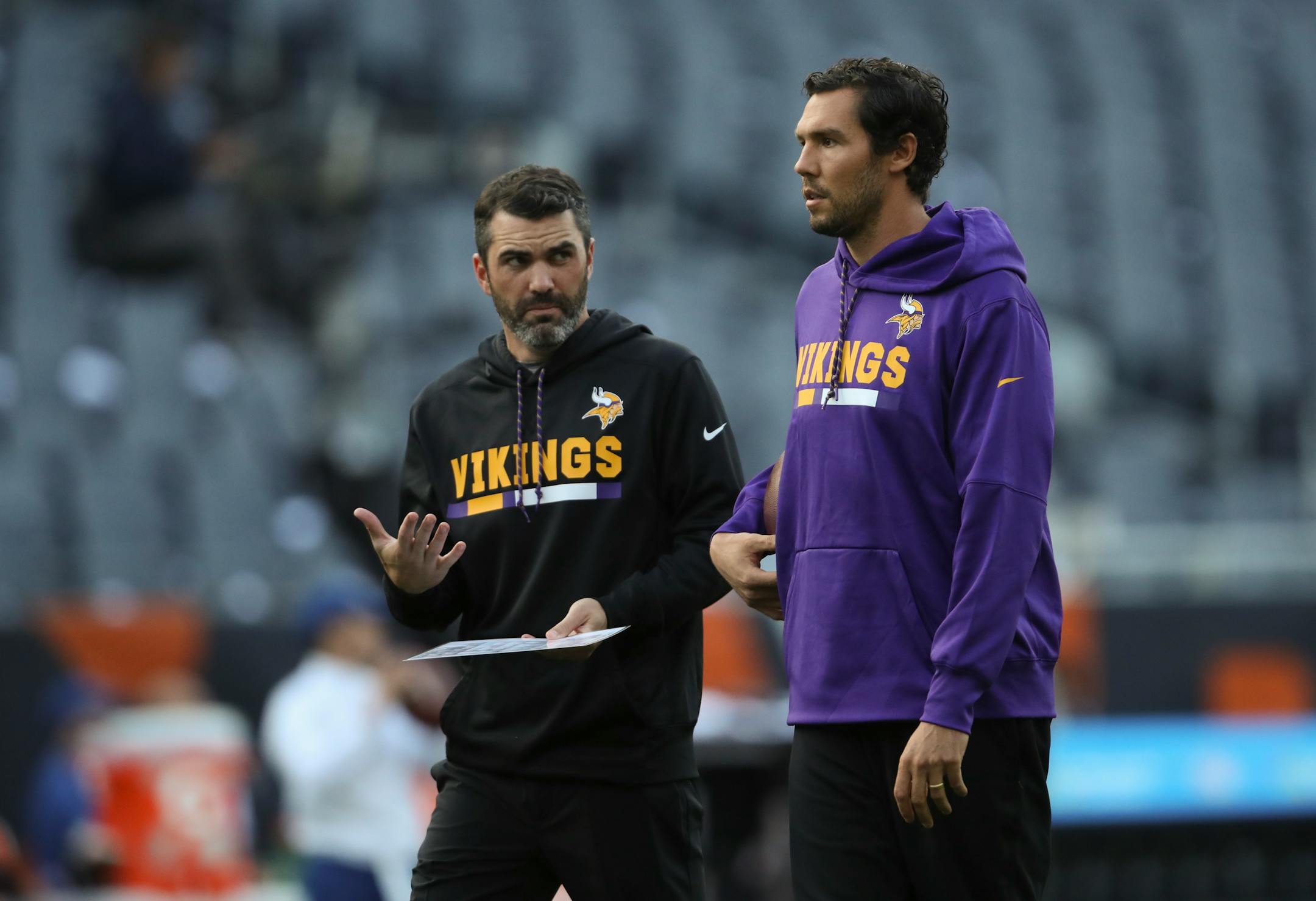 Minnesota Vikings quarterback Sam Bradford was on the field throwing during early warmups Monday evening in Chicago. Here he spoke with Vikings quarterback coach Kevin Stefanski.