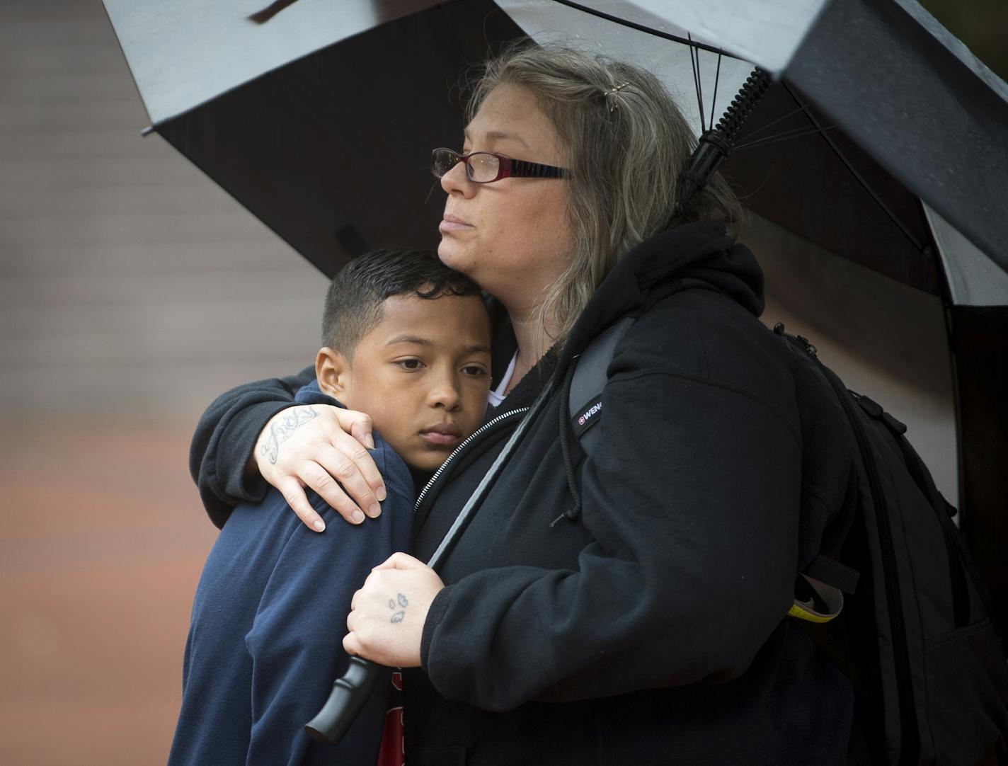 10-year old Taye was embraced by his mother, Susan Montgomery, outside of the Government Center Thursday night. ] Aaron Lavinsky &#x2022; aaron.lavinsky@startribune.com The Black Liberation Project and Black Lives Matter are joining in solidarity to rally for #Justice4Taye on Thursday, May 14, 2015 in downtown Minneapolis. 10-year-old Taye was reportedly maced at a protest Wednesday night when a police officer sprayed the crowd.