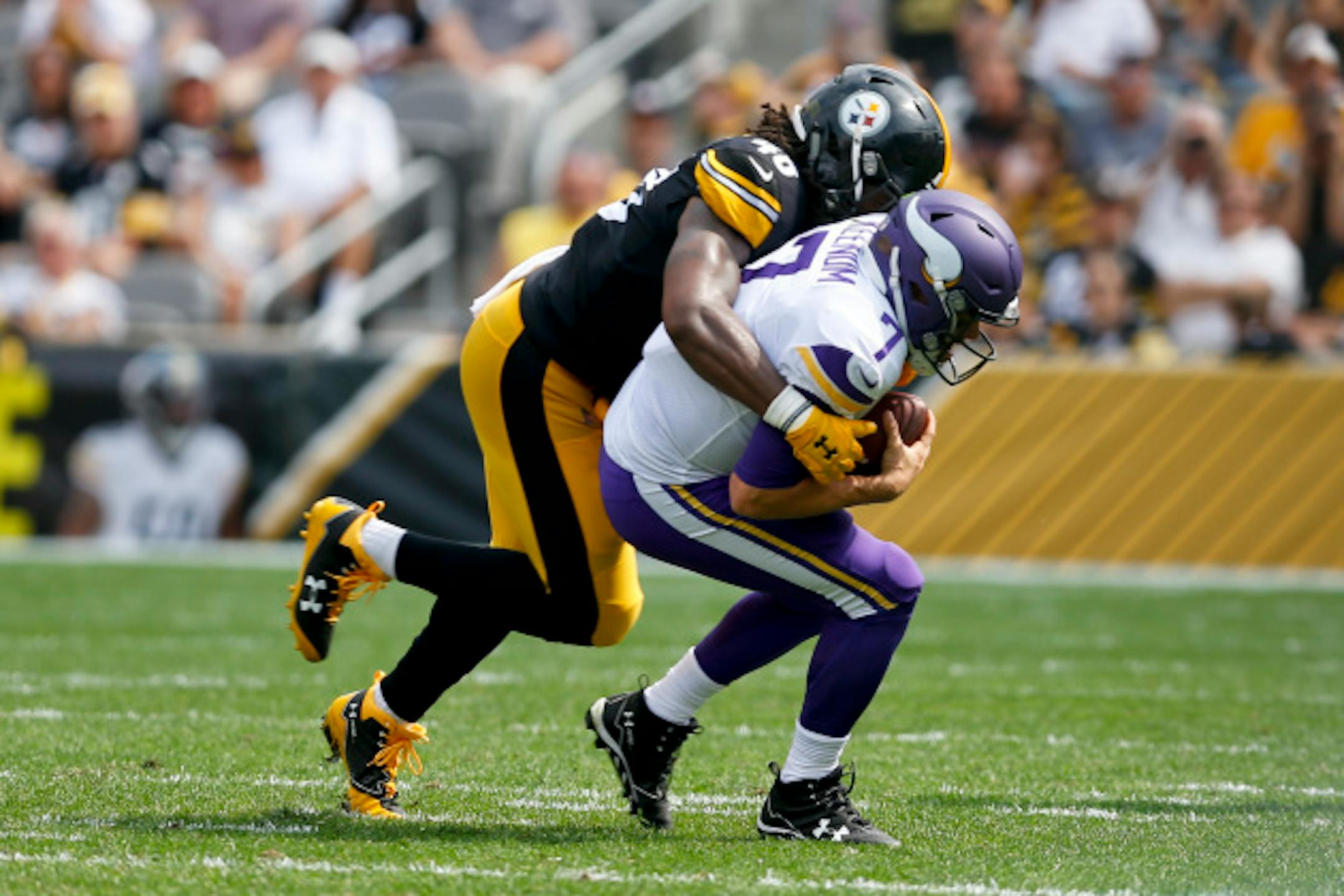 Pittsburgh Steelers outside linebacker Bud Dupree (48) sacks Minnesota Vikings quarterback Case Keenum (7) during the first half of an NFL football game in Pittsburgh, Sunday, Sept. 17, 2017. (AP Photo/Keith Srakocic)