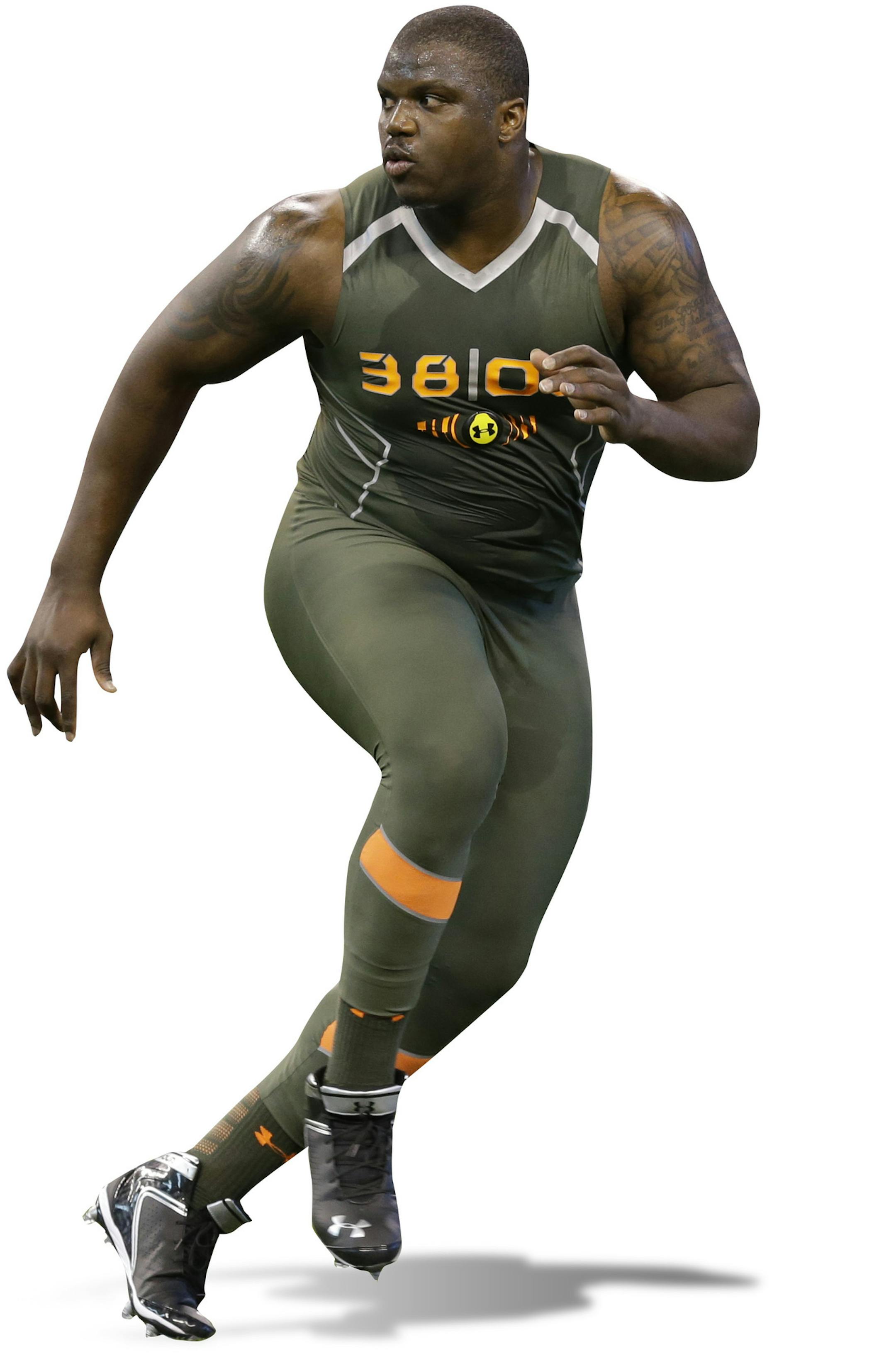 Auburn offensive lineman Greg Robinson runs a drill at the NFL football scouting combine in Indianapolis, Saturday, Feb. 22, 2014. (AP Photo/Michael Conroy) ORG XMIT: INMC10