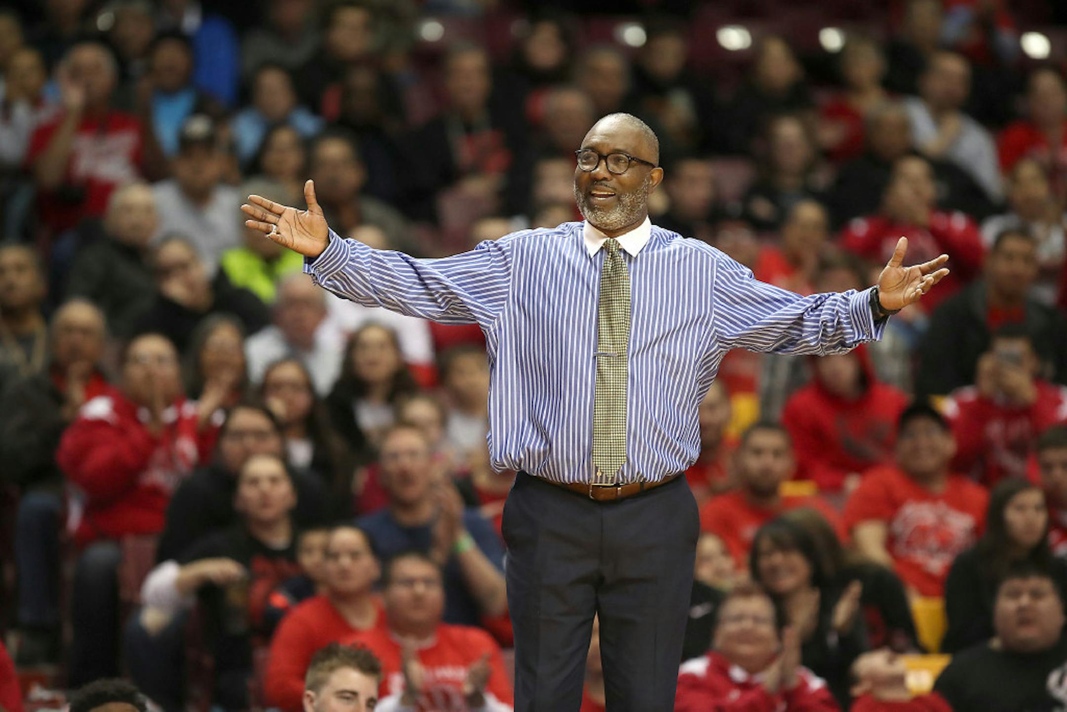 Minneapolis North coach Larry McKenzie, who hopes his team will move up in classification starting next season, looked for a foul call during the Polars' Class 1A quarterfinal game with Red Lake on Thursday at Williams Arena.