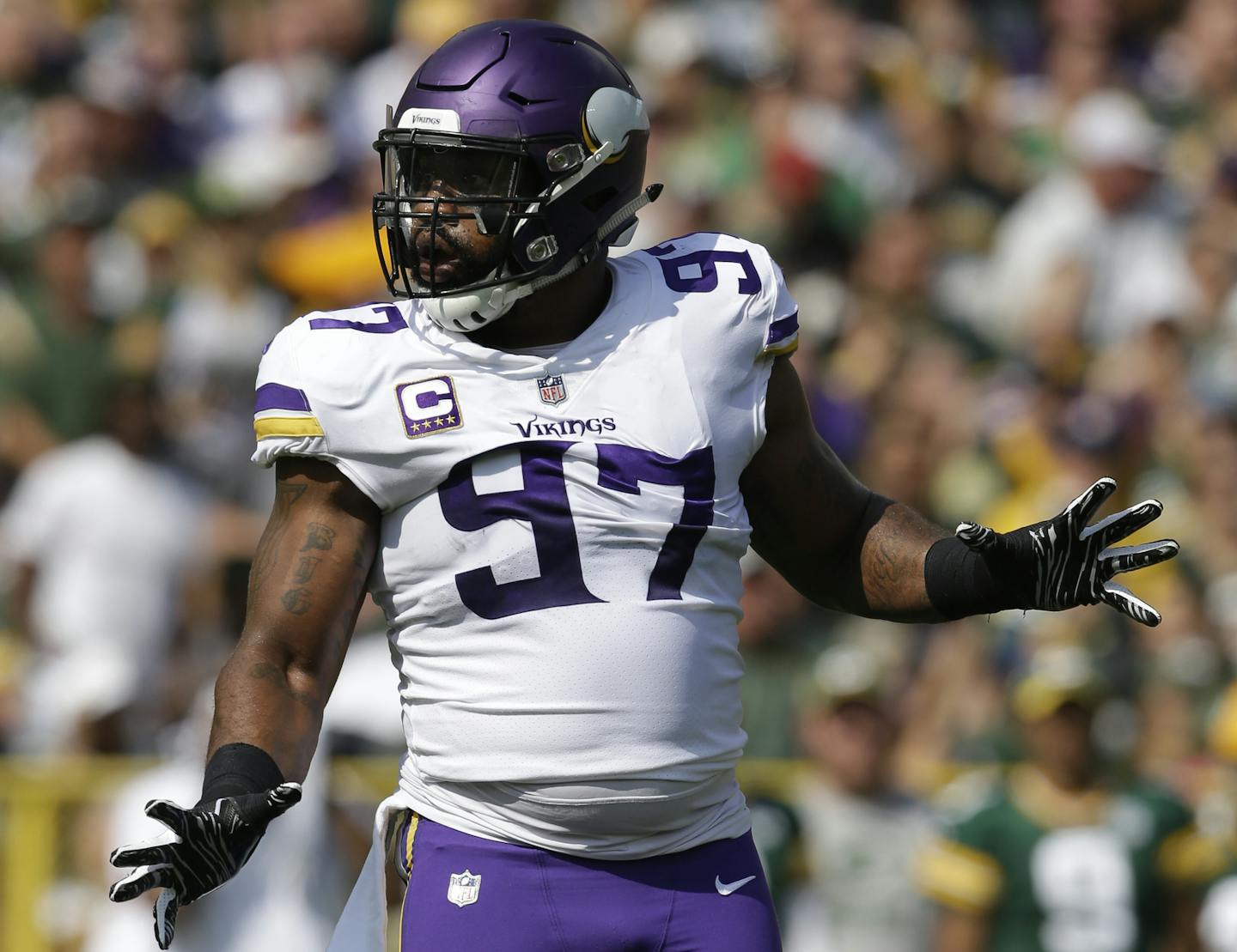 FILE - In this Sunday, Sept. 16, 2018, file photo, Minnesota Vikings defensive end Everson Griffen reacts during the first half of an NFL football game against the Green Bay Packers, in Green Bay, Wis. The Vikings are allowing the sixth-highest passer rating in the NFL one-quarter of the way through this season. One problem has been a pass rush negated by rollouts and misdirections cleverly used by opponents. (AP Photo/Jeffrey Phelps, File) ORG XMIT: NY160