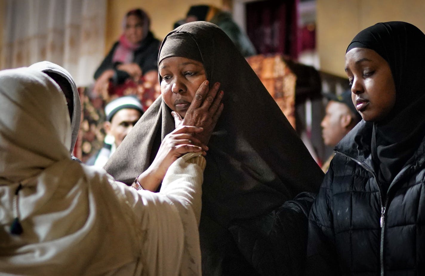 Firdaus Aden was comforted after Friday prayers at the Darul Quba mosque. Her mother Nadifa F Mohamud, was killed in the Wednesday morning Cedar Riverside fire. ] GLEN STUBBE &#x2022; glen.stubbe@startribune.com Friday, November 29, 2019