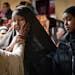 Firdaus Aden was comforted after Friday prayers at the Darul Quba mosque. Her mother Nadifa F Mohamud, was killed in the Wednesday morning Cedar River