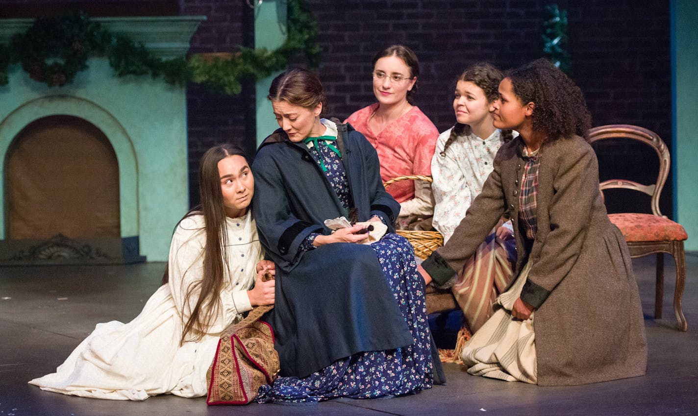 Isabella Star LaBlanc as Beth, Christina Baldwin as Marmee, Christine Weber as Meg, Megan Burns as Amy and C. Michael Menge as Jo in "Little Women" at the Jungle Theater.