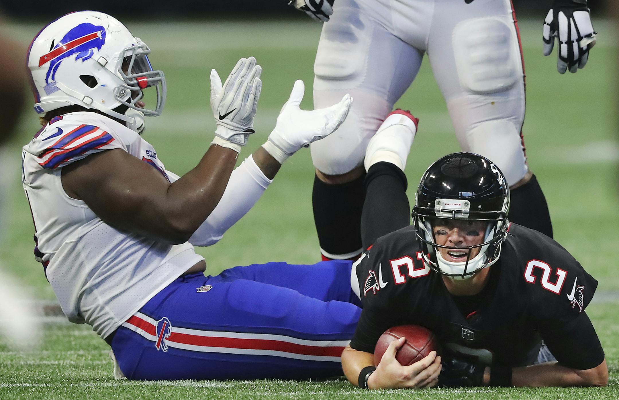 Buffalo Bills defensive tackle Cedric Thornton reacts to sacking Atlanta Falcons quarterback Matt Ryan during the second half of a NFL football game, Sunday, Oct. 1, 2017, in Atlanta. (Curtis Compton/Atlanta Journal-Constitution via AP)