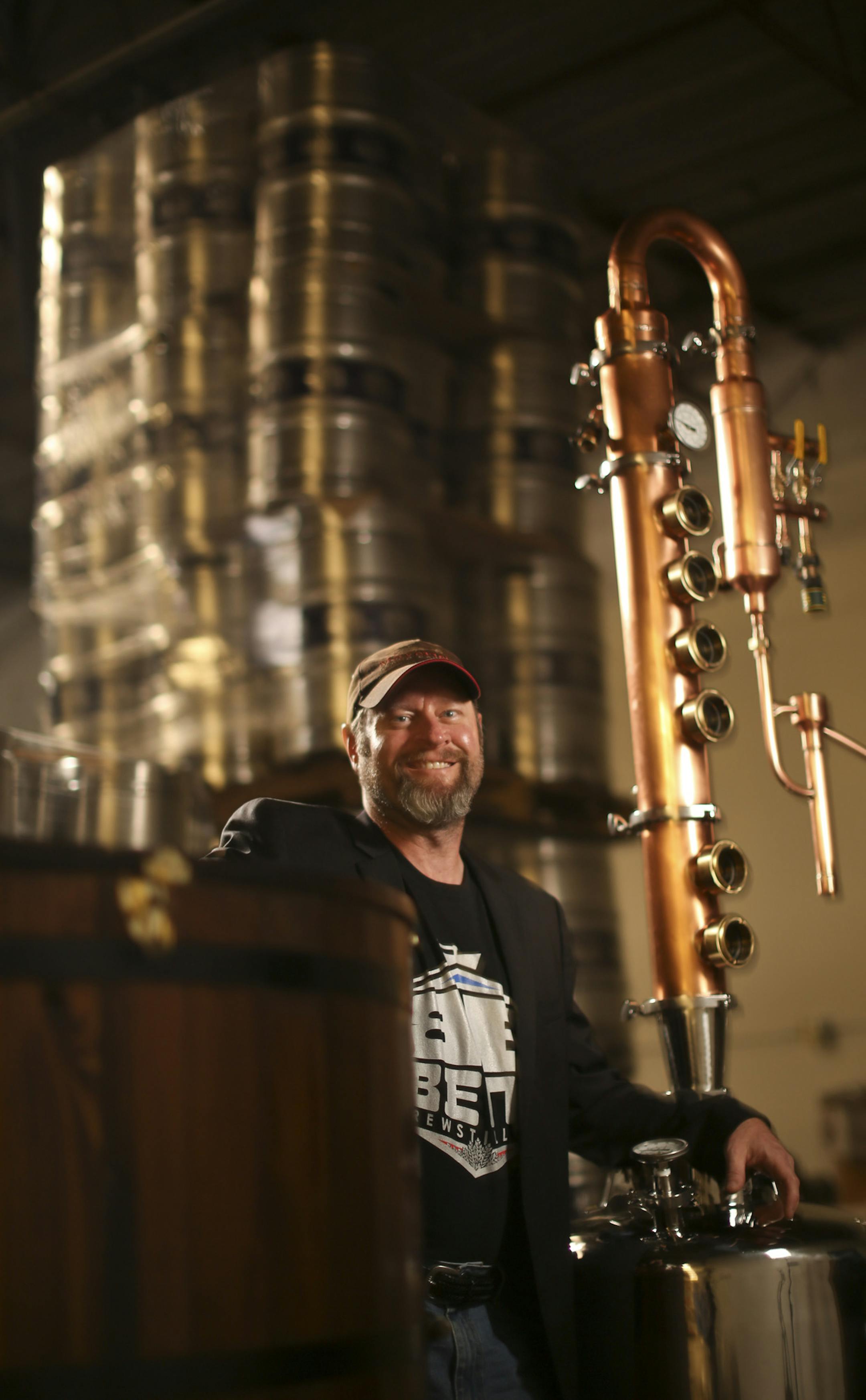 Bartley Blume's Bent Brewstillery is joining the surge of craft breweries in the Twin Cities. His brand will have something the others don't: a still for making small batches of distilled spirits. Like whiskey. For now, he's contracting with Pour Decisions in Roseville to brew his beer. By fall he hopes to have his still up and running under their roof. Bartley Blume with some components for his still Sunday afternoon, June 9, 2013 at Pour Decisions Brewing Co. in Roseville, Minn. Behind him is