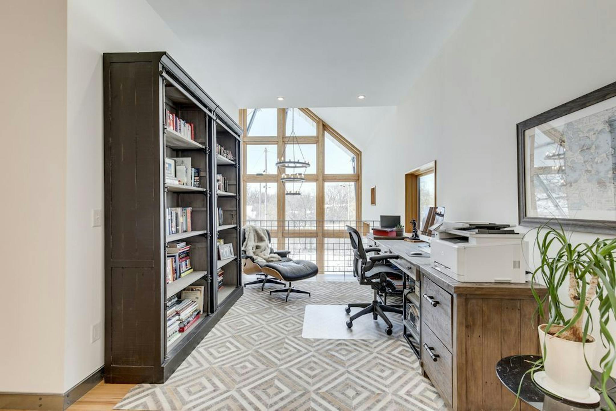 A second-floor office overlooks the living room.