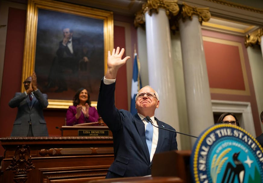Minnesota Gov. Tim Walz acknowledges applause before delivering his State of the State address to a joint session of the Legislature at the State Capitol in St. Paul, Minnesota, on Wednesday, April 23, 2025.