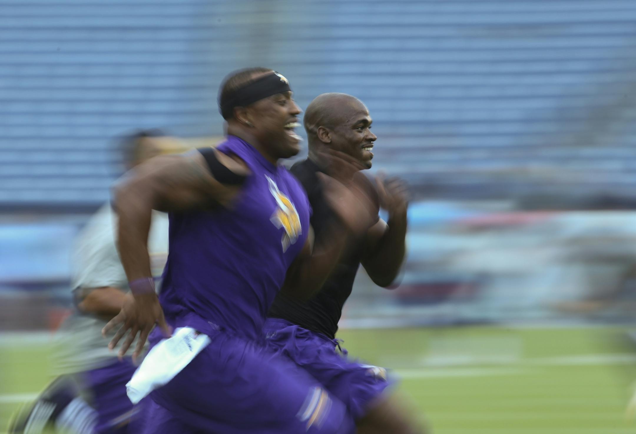 Minnesota Vikings defensive end Everson Griffen, left, and running back Adrian Peterson raced during a pre-game warmups Thursday night at LP Field in Nashville.