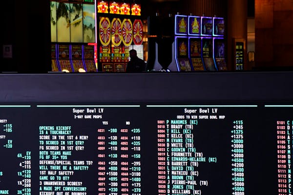 FILE - Betting odds for NFL football's Super Bowl 55 are displayed on monitors at the Circa resort and casino sports book, Wednesday, Feb. 3, 2021, in
