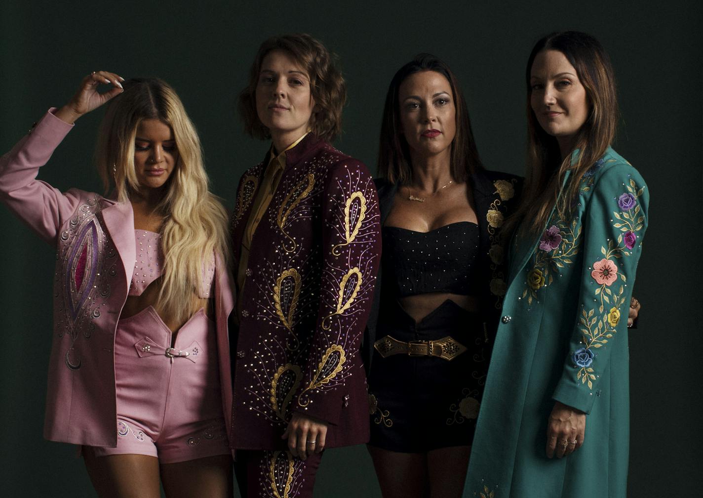 From left: Maren Morris, Brandi Carlile, Amanda Shires, and Natalie Hemby of the Highwomen before their set at the Newport Folk Festival in Newport, R.I., July 26, 2019. The group proudly call themselves a movement as much as a band, one whose mission is clear: solidarity, specifically with other women in country music. (Cody O'Loughlin/The New York Times)