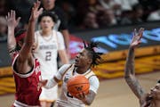Gophers guard Elijah Hawkins drives to the basket during Wednesday's 70-58 home loss to Indiana.
