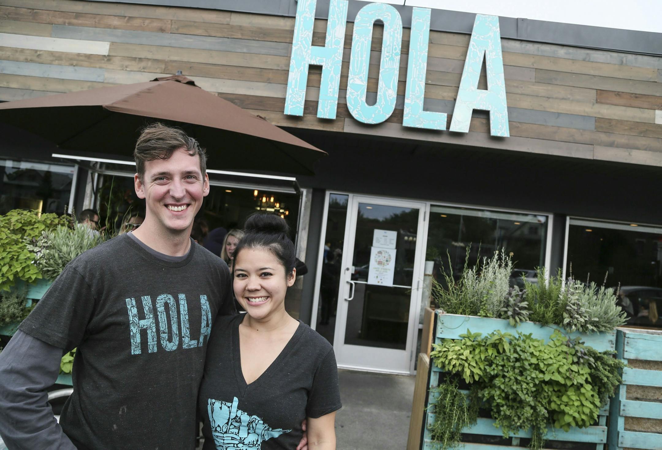 Hola Arepa, one of the city's great food trucks and now a restaurant, with co-owners Birk Grudem and Christina Nguyen Friday, Sept. 12, 2014, in Minneapolis, MN.