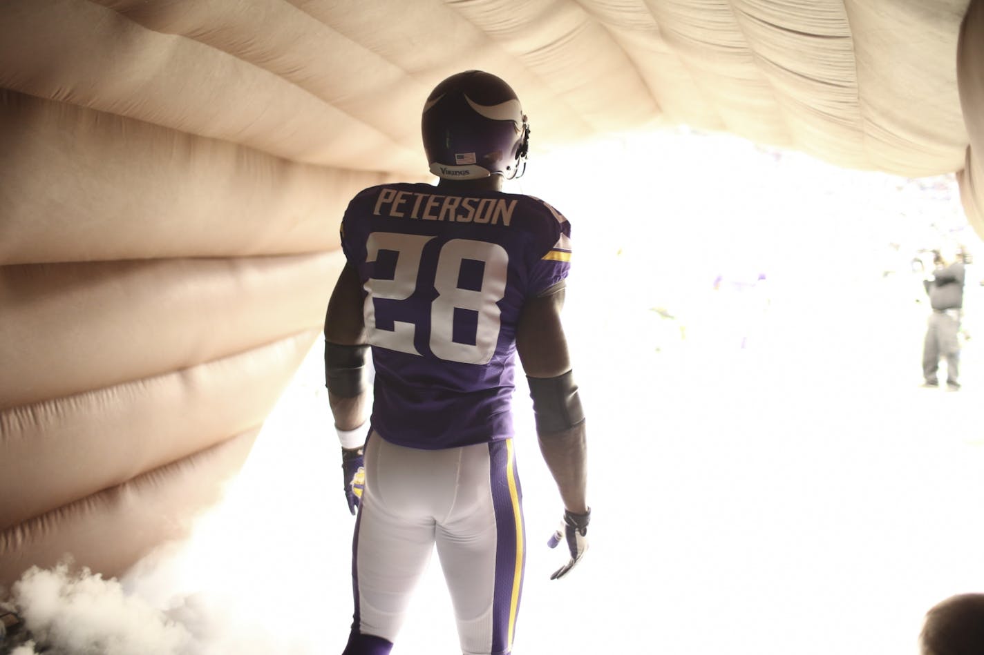 The Minnesota Vikings eeked out a 23-20 overtime win over the Chicago Bears in an NFL football game Sunday afternoon, December 1, 2013 and Mall of America Field in Minneapolis. Minnesota Vikings running back Adrian Peterson (28) waited in the tunnel before being introduced before Sunday's game.