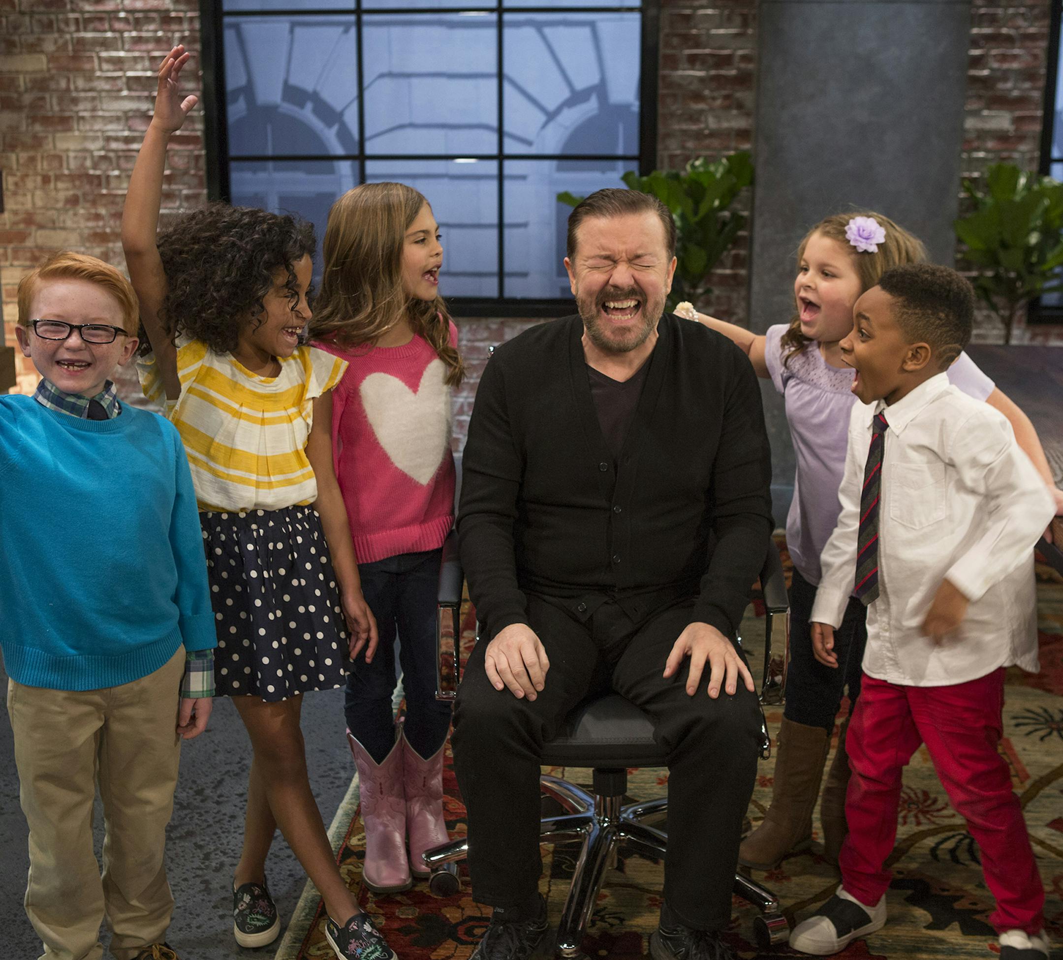 Ricky Gervais with a panel of kids on "Child Support." (ABC/Eric Liebowitz)